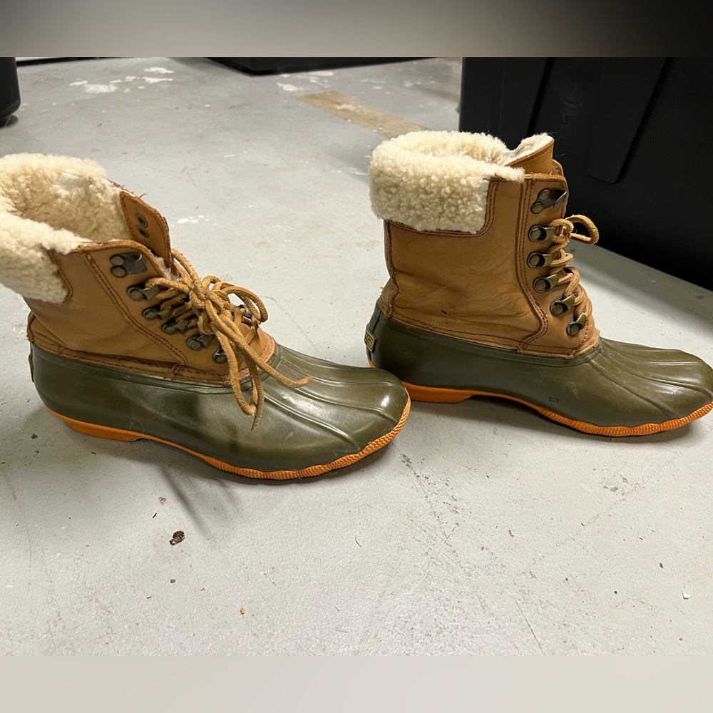 Sperry winter boots, sold at JCrew, orange bottoms!